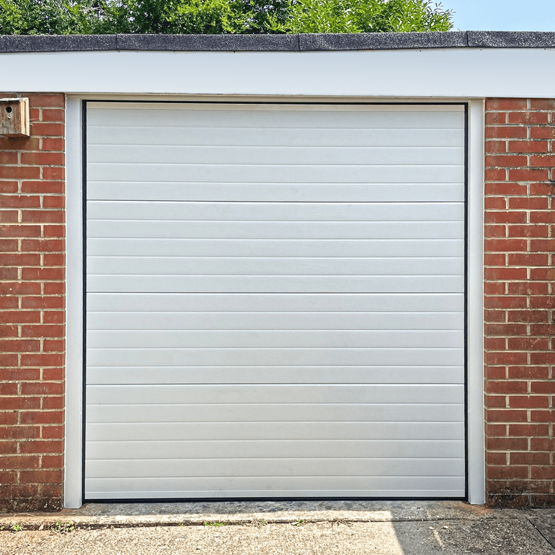 White sectional garage door, small-rib panel design